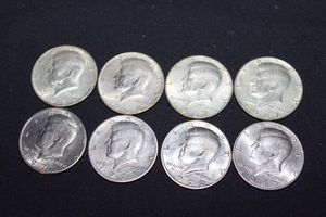 lot 135 image: Variety of 8 Kennedy Half Dollars