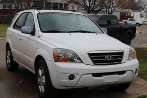 lot 1 image: CORRECTION 2007 KIA SORENTO has Salvaged Title Runs and drives good