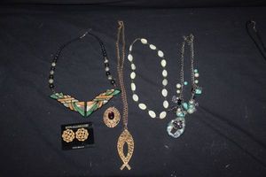 lot 14 image: Art Deco Lapis Lazuli Necklace, Beautiful Cross sea glass necklace,  Mother of Pearl Beaded necklace, Amethyst and Turquoise pendant and Fish Pendant on chain