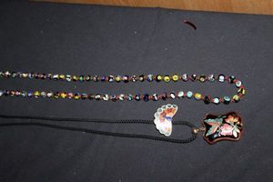 lot 24 image: Millefiori Beaded Necklace, Antique Brass Enamel Butterfly Pendant and Peacock Pendant