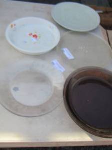 lot 37 image: pie plates, microwave plate, dinner plates