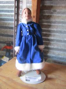 lot 60 image: doll on stand
