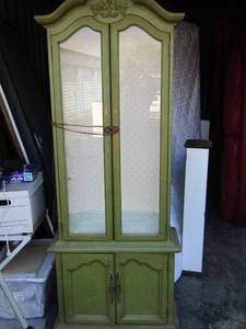 lot 5 image: Curio cabinet olive green color 2 doors on top and bottom