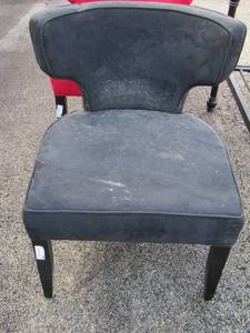 lot 23 image: black padded chair needs cleaned