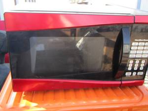 lot 118 image: Red Hamilton Beach Microwave
