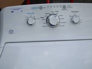 lot 4 image: GE washer used but still in good condition
