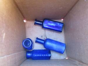 lot 182 image: vintage blue glass bottles