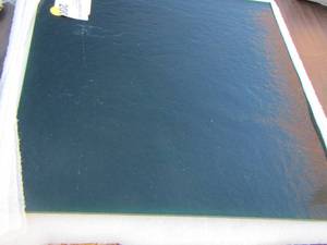 lot 200 image: green stain glass pieces