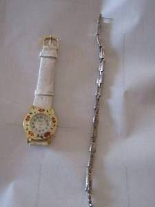 lot 373 image: ladies watch- ladies bracelet