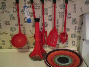 lot 81 image: set of red kitchen utensils