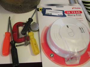 lot 137 image: new smoke alarm and various tools