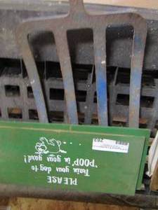lot 283 image: pitch fork - sign says teach your dog to poop in your yard
