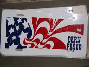 lot 296 image: DARN PROUD license plate covers
