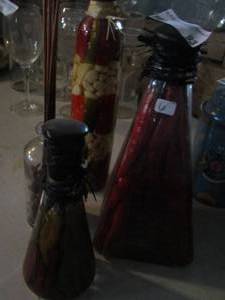 lot 93 image: kitchen dcor canisters with peppers and oils