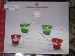 lot 235 image: International candle stand from silver co. ,