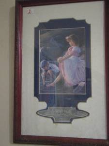 lot 309 image: framed art of little boy cleaning girls foot