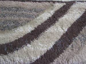 lot 134 image: Brown and Tan rug unknown size
