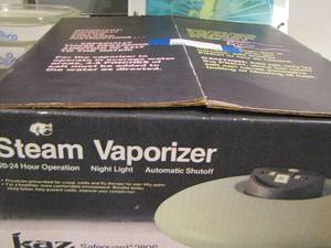 lot 77 image: Steam vaporizer in box