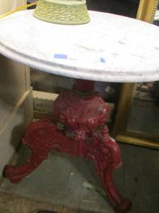 lot 38 image: Marble top side table with red iron bottom 33x22