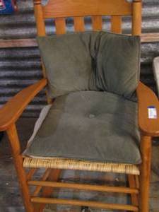 lot 82 image: Rocking chair with cushions