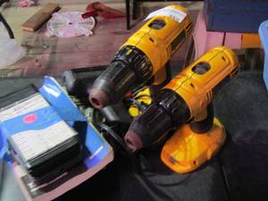 lot 355 image: DeWalt drills, Manuel books