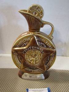 lot 18 image: JIM BEAM BOTTLE Centennial Nickel design  with lid