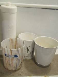 lot 444 image: toilet paper holder and 3 bathroom trash cans