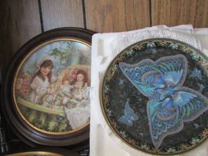 lot 490 image: butterfly and little girl decorative wall plates