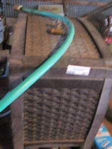 lot 467 image: water hose storage with spout
