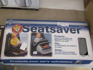 lot 573 image: seat saver protects car seats from getting damage from car seat