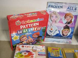 lot 580 image: Cocomelon pattern party, Cocomelon colors and counting , and more