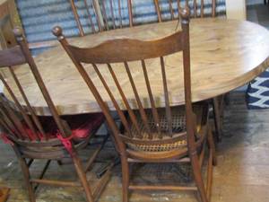 lot 639 image: Vintage dining table with four wicker chairs that need repairs in seat, standard size actual size unknown