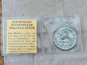 lot 166 image: 1964 vintage Mexican silver dollar