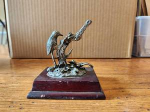 lot 89 image: Metal and wood bird figurine