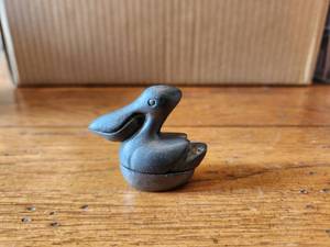 lot 90 image: Vintage pewter pelican trinket keeper