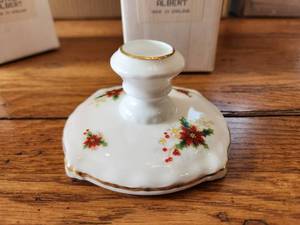 lot 44 image: Pair of Royal Albert candlestick holders