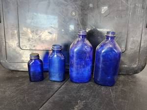 lot 174 image: Selection of vintage blue glass jars - Phillips