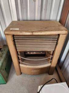 lot 219 image: Vintage Dearborn gas heater
