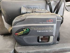 lot 200 image: Panasonic Palmcorder and accessories and bag