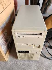 lot 209 image: Vintage computer tower with cord