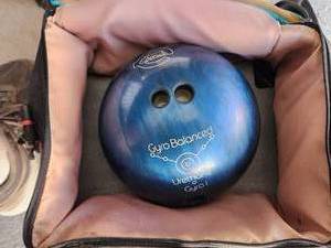 lot 210 image: Bowling ball and shoes