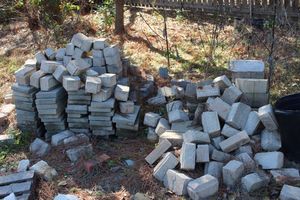 lot 26 image: Large Quantity of Flat Paving Stones and Flower Bed Boarder Stones Buyer is Responsible for Loading, MUST TAKE ALL