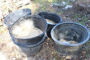 lot 31 image: 30 Gallon Pots Approximately half full of Sand