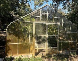 lot 1 image: American Classic Greenhouse, from Texas Greenhouse Company Buyer is responsible for disassembly and removal of greenhouse, Seller has complete Construction documents Greenhouse does have a few broken Pieces of Glass from Ice Storm CONTENTS NOT INCLUDED