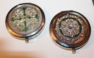 lot 9 image: Two Vintage Ornate Compact Mirrors