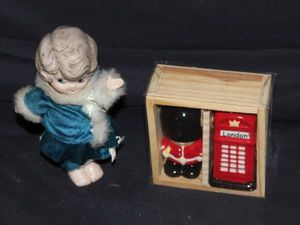 lot 11 image: Vintage Salt and pepper Shaker and Bisque Doll