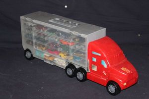 lot 20 image: Hot Wheels Toy Storage 18 wheeler and Contents