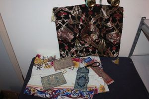 lot 61 image: Throw Pillow Cover, Small purses and Eye Glass case and Bookmark all from Turkey, Table Cloth 60x80