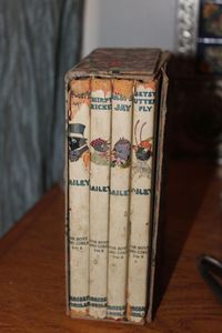 lot 74 image: Books Set of 4 Tuck-Me-In Tales