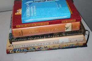 lot 76 image: Books Souvenirs From Georgia, A Short History of Russia, Travel in Georgia, 52 More OffBeat Texas stops, Geogian, Phrasebook & Dictionary